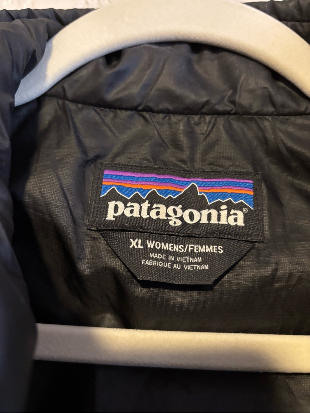 Patagonia Black Women's Puffer vest with Multicolor Logo